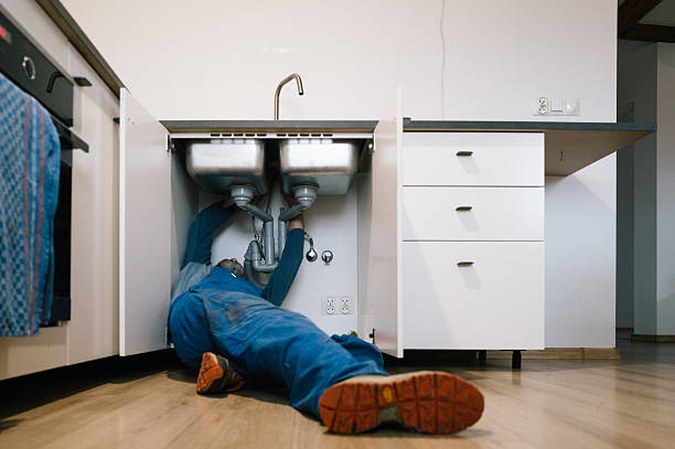 Professional Drain Cleaning technician working in Emmett, MI
